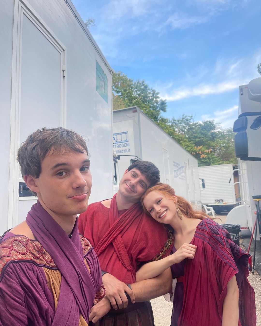 A behind the scenes photo of actress and singer Joelle playing the character Vipsania, Ewan Horrocks playing Drusus and Ethan Moorhouse playing Vistilius.